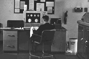 Alan Turing with the Manchester Mark 1 Computer